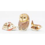 Three Royal Crown Derby paperweights to include an owl, tortoise and wren, all with silver stoppers