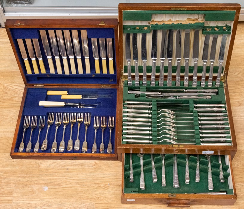 An early 20th Century mahogany canteen of cutlery having eight place settings, in EPNS, together