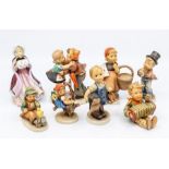 Seven Hummel figures of children, circa 20th Century