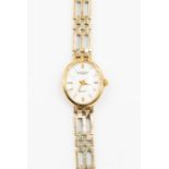 A 9ct gold ladies Rotary wristwatch, oval white dial approx. 14 x 17mm, gold tone baton markers,