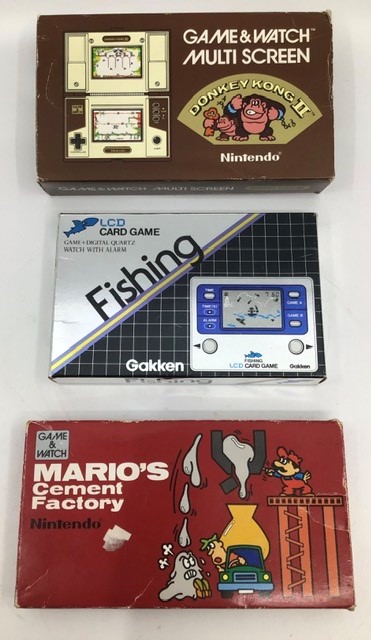 Nintendo: A boxed Nintendo, Mario's Cement Factory, Game & Watch, 1983, ML-102; together with a