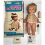 Palitoy: A boxed 1960’s vinyl, Baby Maybe, complete with feeding spoon and bottle. She takes her
