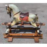 A Victorian Ayres, London, children's rocking horse, original horse hair mane and tail, dapple-grey,