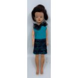 Sindy: A mid-20th century, unboxed Sindy doll, appears to be in original turquoise and black