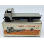 Dinky: A boxed Dinky Supertoys, Guy Flat Truck no.513, no tailboard. Rare grey/black chassis. Non