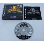 Sega Mega: A cased Sega Mega CD, Mighty Morphin Power Rangers, 1995, disc has a couple of small