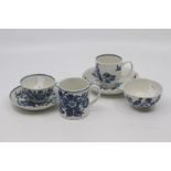 Two Worcester porcelain trios, circa 1770-90, each comprising teacup, coffee cup and saucer, the