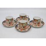 Four Royal Crown Derby coffee cans and saucers, dated 1927, decorated with pattern 6041. (4)