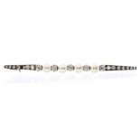 An Edwardian natural pearl and diamond bar brooch, the brooch set with four round pearls with