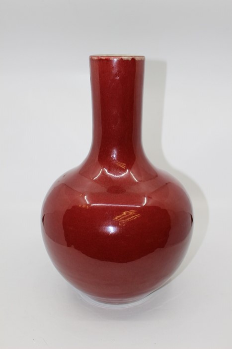 A Sang de Boeuf vase, Yongzheng mark but probably 19th Century, in the Tian Quping shape, 34cms high