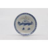 A Worcester miniature or 'toy' saucer, circa 1770, of plain circular form, painted in blue with a
