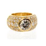 A diamond and 18ct gold dress ring, set to the centre with a round brilliant cut diamond weighing
