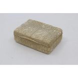 A carved ivory snuff box, possibly French, 18th/19th Century, of rectangular outline and carved with