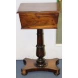 An early 19th Century rosewood teapoy, circa 1825, the lid opening to reveal a fitted interior of