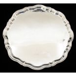 An Elizabeth II plain silver tray, raised scalloped border, by Charles S Green & Co Ltd, Birmingham,