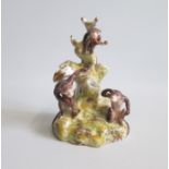 A Staffordshire Spill ring holder with three playful Monkeys Date: circa 1840-50 Size: 7cm diameter,