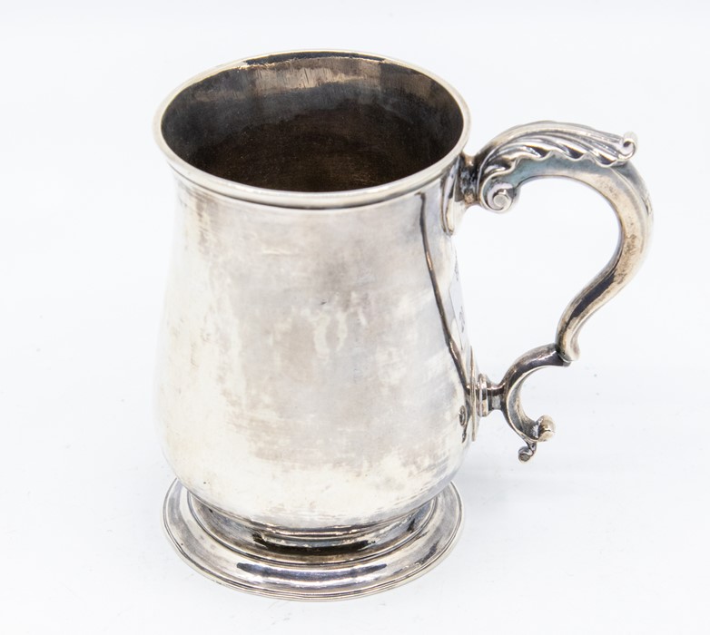A George III silver baluster form christening mug, by John King (probably), assayed London 1773,