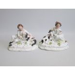 A Pair of Staffordshire Rustic Groups of a Boy and his Shepherd Dog and a Girl and her Goat.