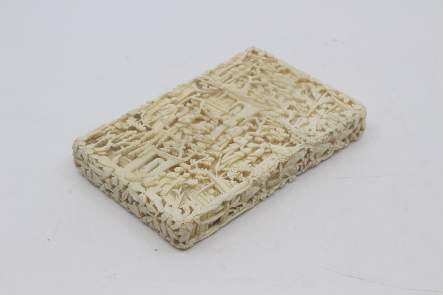 A Chinese Canton carved ivory card case, late 19th Century, of rectangular outline and worked in - Image 2 of 4