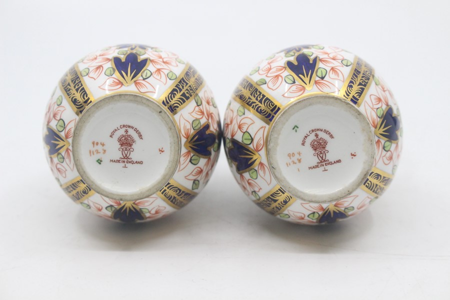 A pair of Royal Crown Derby Imari ovoid ewers, dated 1922, decorated with pattern 1128, 18.5cm high. - Image 4 of 4