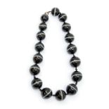 A Victorian single graduated banded agate bead necklace, the largest bead approx. 22.4mm, the