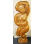 Simon Manby (British, b.1942), Standing female nude, carved wood, 100cm high.
