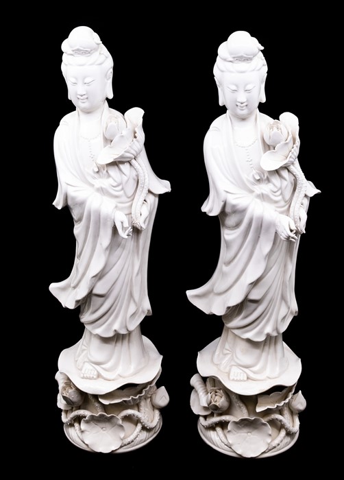 Two identical Chinese 'blanc-de-chine' figures of Guanyin, 20th Century, modelled standing and