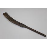 A ceremonial wooden paddle club, believed South Pacific, 18th/19th Century, of curved bevelled