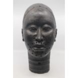 A large bronze commemorative head, Benin, 18th/19th Century, life size and cast as a male,