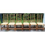 A Rupert Griffiths Arts and Crafts Monastic Woodcraft set of six joined oak slatted back dining
