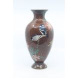 A Japanese cloisonne vase, Meiji period, of ovoid form with everted rim, worked in silver wire