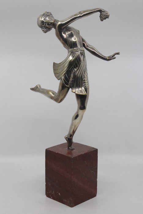 After J.D.Guirand, 'Bacchante', a silver plated bronze study of a dancing girl, modelled in mid pose