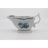 A Worcester strap fluted sauce boat, circa 1760-65, of ovoid form and moulded with cartouches on a