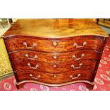 A George III mahogany serpentine fronted chest of drawers, circa 1765, comprising four long