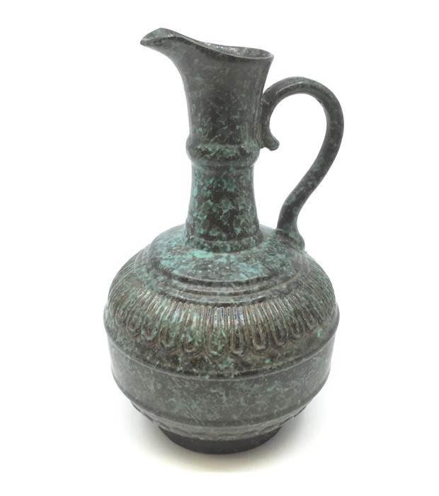 A Chinese Burnished bronze effect Porcelain Ewer bearing inscissed Qianlong mark with molded