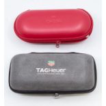 An Omega wristwatch carry case, in classic red livery with zip closing and embossed logo, the inside