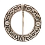 Alexander Ritchie- A Scottish silver kilt/plaid brooches, circular form with embossed Celtic