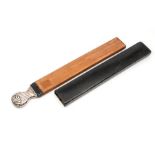 An Edwardian silver handled strop, London 1905 approx 34.5cm long, in leather case