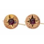 A pair of early 20th Century 15ct gold circular disk earrings, comprising star set tourmaline set to