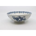 A Worcester punch bowl, circa 1775-85, of plain rounded form and printed in blue with the 'Fruit and