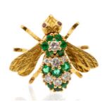 Tiffany & Co-  a diamond and emerald 18ct yellow and white gold bee brooch, the body set with
