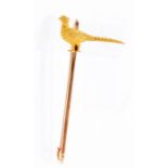 Sporting interest- A Victorian 9ct gold pheasant brooch, the rose metal bar brooch stamped 9ct