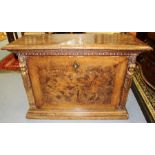 An 18th Century European burr veneered cabinet, the fall front opening to reveal drawers and two