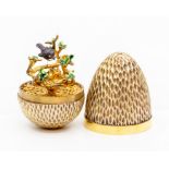 Stuart Devlin silver gilt surprise 'Robin' egg, decorative honeycomb like textured form opening to