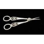 A pair of Modern silver grape scissors, pierced decoration to handles, by David Shaw Silverware Ltd,