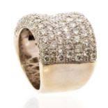 A diamond and 18ct white gold dress ring, comprising a concave band set with eleven rows of