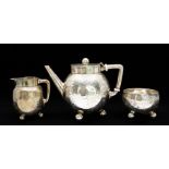 A Victorian silver three piece Batchelor's tea set, ovoid bodies engraved with fern leaf