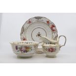 An extensive early 19th Century Coalport tea and coffee service, of scroll moulded shape and