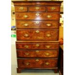 A George I walnut chest on chest, circa 1720, the upper section with three short drawers over