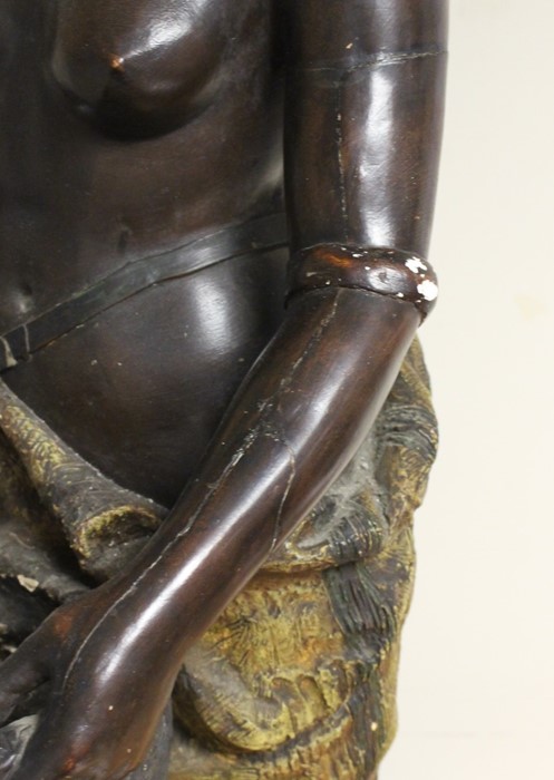 A large Goldscheider terracotta Blackamoor figure of a bare breasted nubile, standing holding a - Image 3 of 3